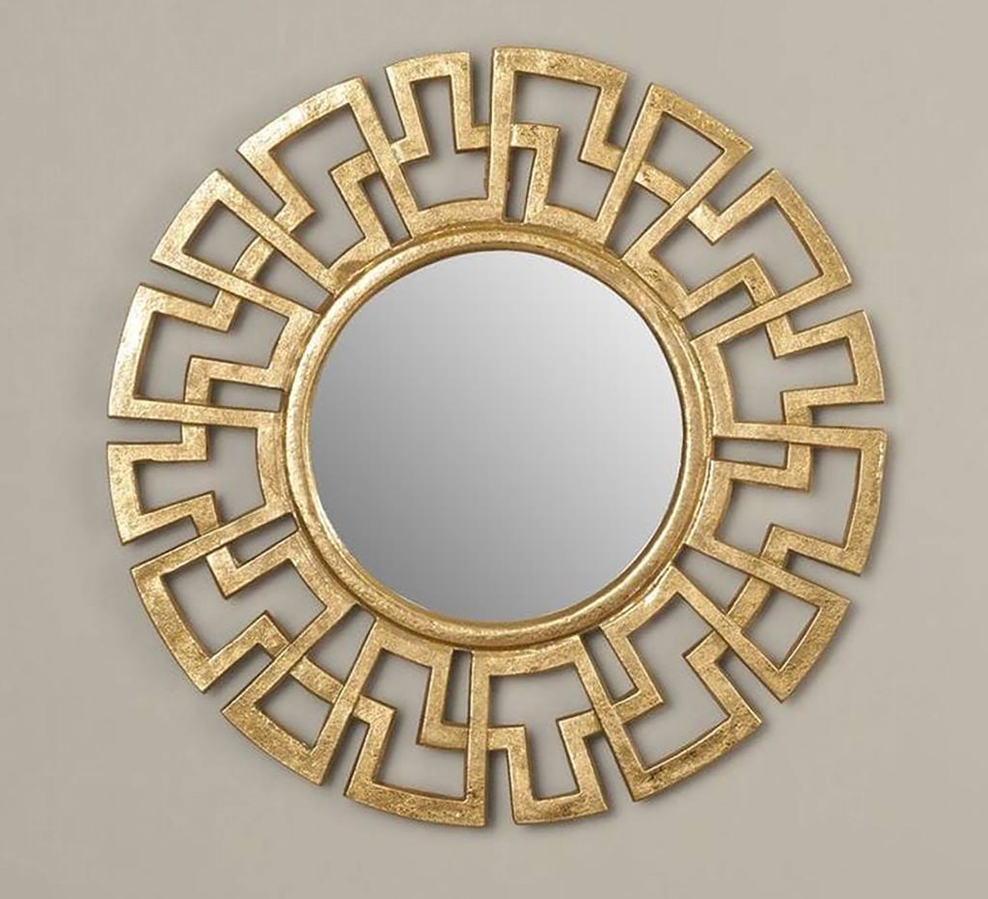 A circular mirror with a frame of hollow overlapping circles