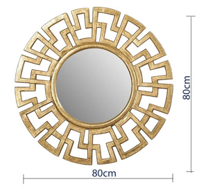 A circular mirror with a frame of hollow overlapping circles