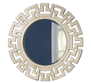 A circular mirror with a frame of hollow overlapping circles