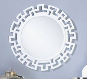 A circular mirror with a frame of hollow overlapping circles