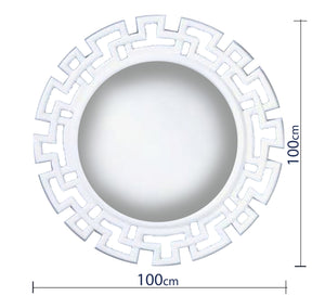 A circular mirror with a frame of hollow overlapping circles