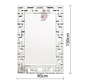 Rectangular mirror with a frame of geometric shapes