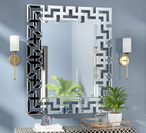 Rectangular mirror with a frame of geometric shapes