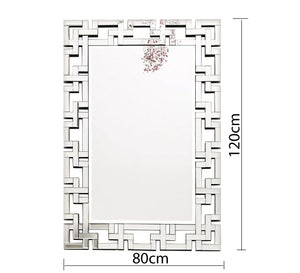 Rectangular mirror with a frame of geometric shapes