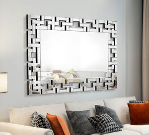 Rectangular mirror with a frame of geometric shapes