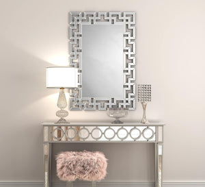 Rectangular mirror with a frame of geometric shapes