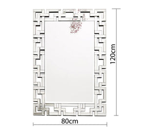 Rectangular mirror with a frame of geometric shapes