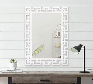 Rectangular mirror with a frame of geometric shapes