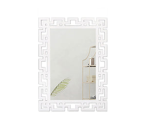 Rectangular mirror with a frame of geometric shapes