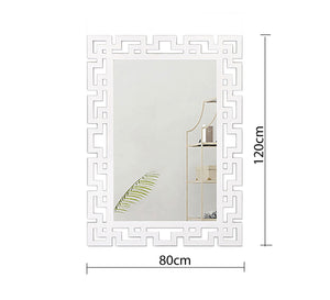 Rectangular mirror with a frame of geometric shapes