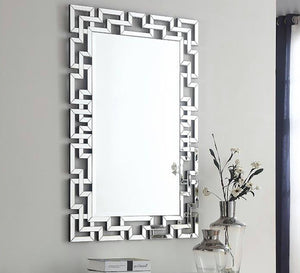 Rectangular mirror with a frame of geometric shapes