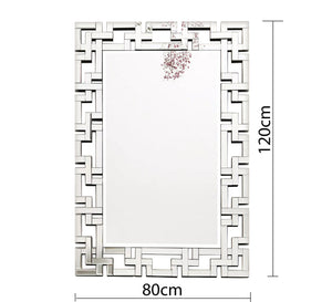 Rectangular mirror with a frame of geometric shapes