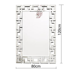 Rectangular mirror with a frame of geometric shapes