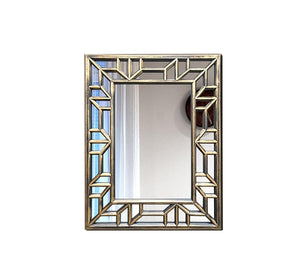 A rectangular mirror with two frames one of which is hollow wood