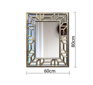 A rectangular mirror with two frames one of which is hollow wood