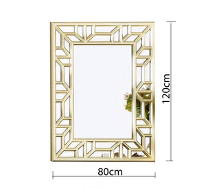 A rectangular mirror with two frames one of which is hollow wood