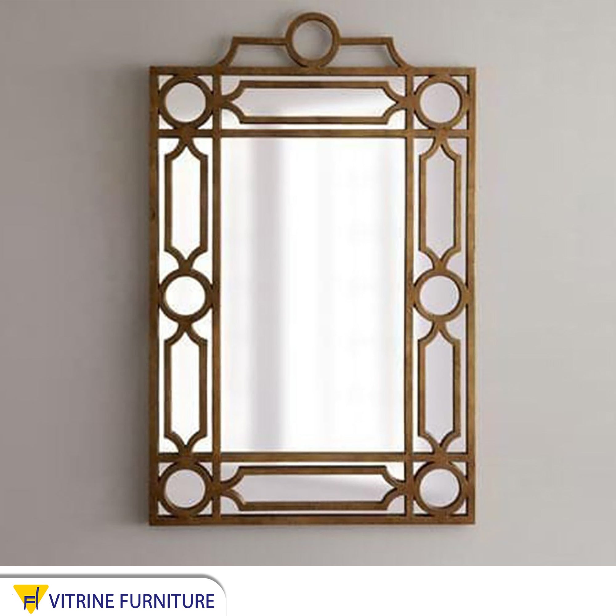 A rectangular mirror with a frame decorated with hollow circles