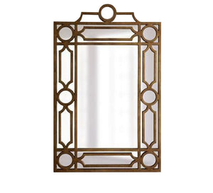 A rectangular mirror with a frame decorated with hollow circles