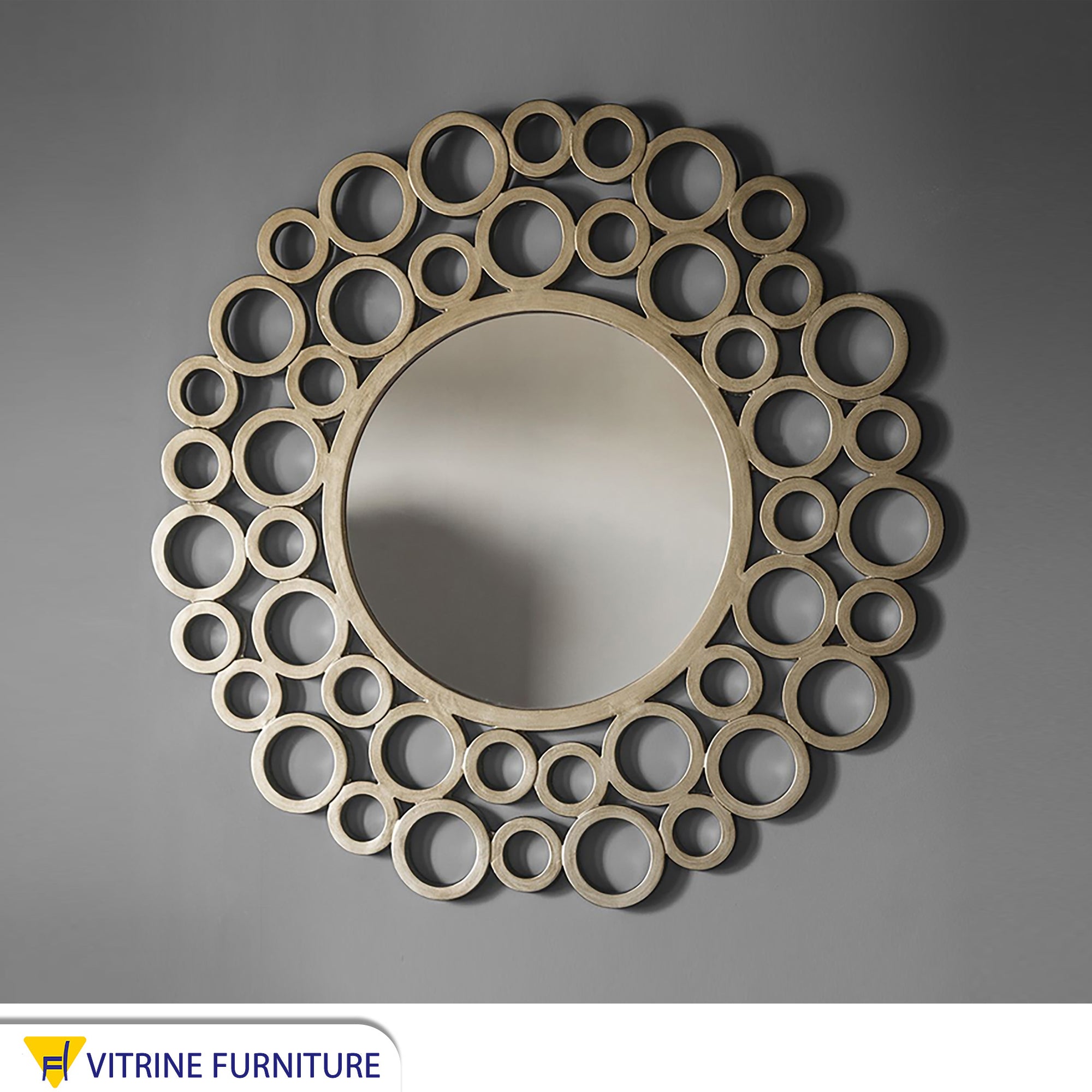 A circular mirror with a frame of multiple wooden circles