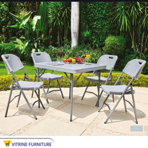 Outdoor dining table set with chairs