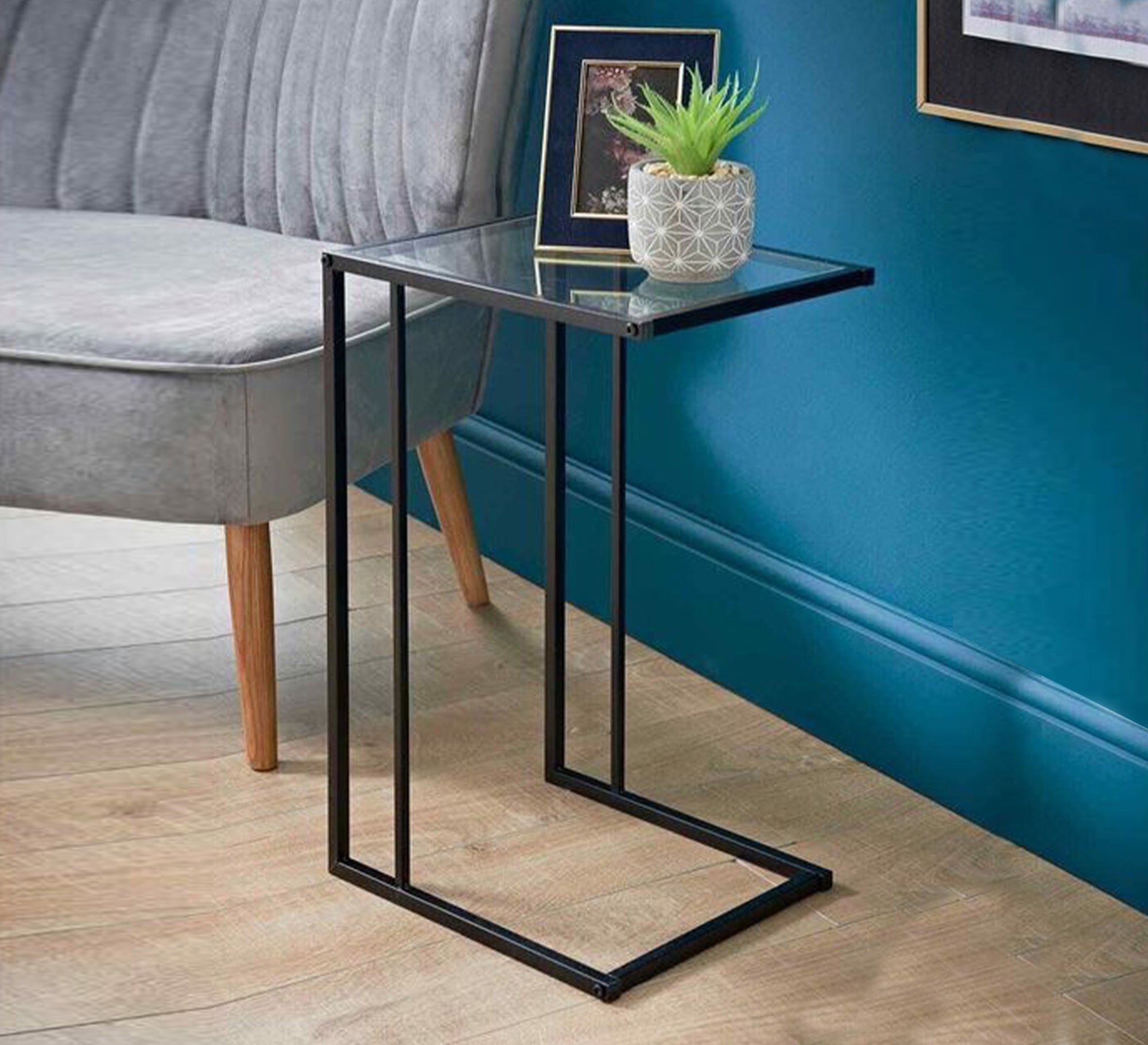 Side table with glass surface