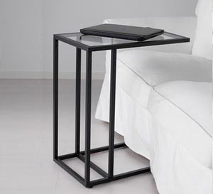 Side table with glass surface