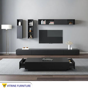 TV unit with three upper boxes and a modern table