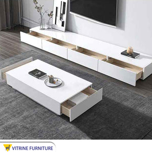 Modern white TV unit and table