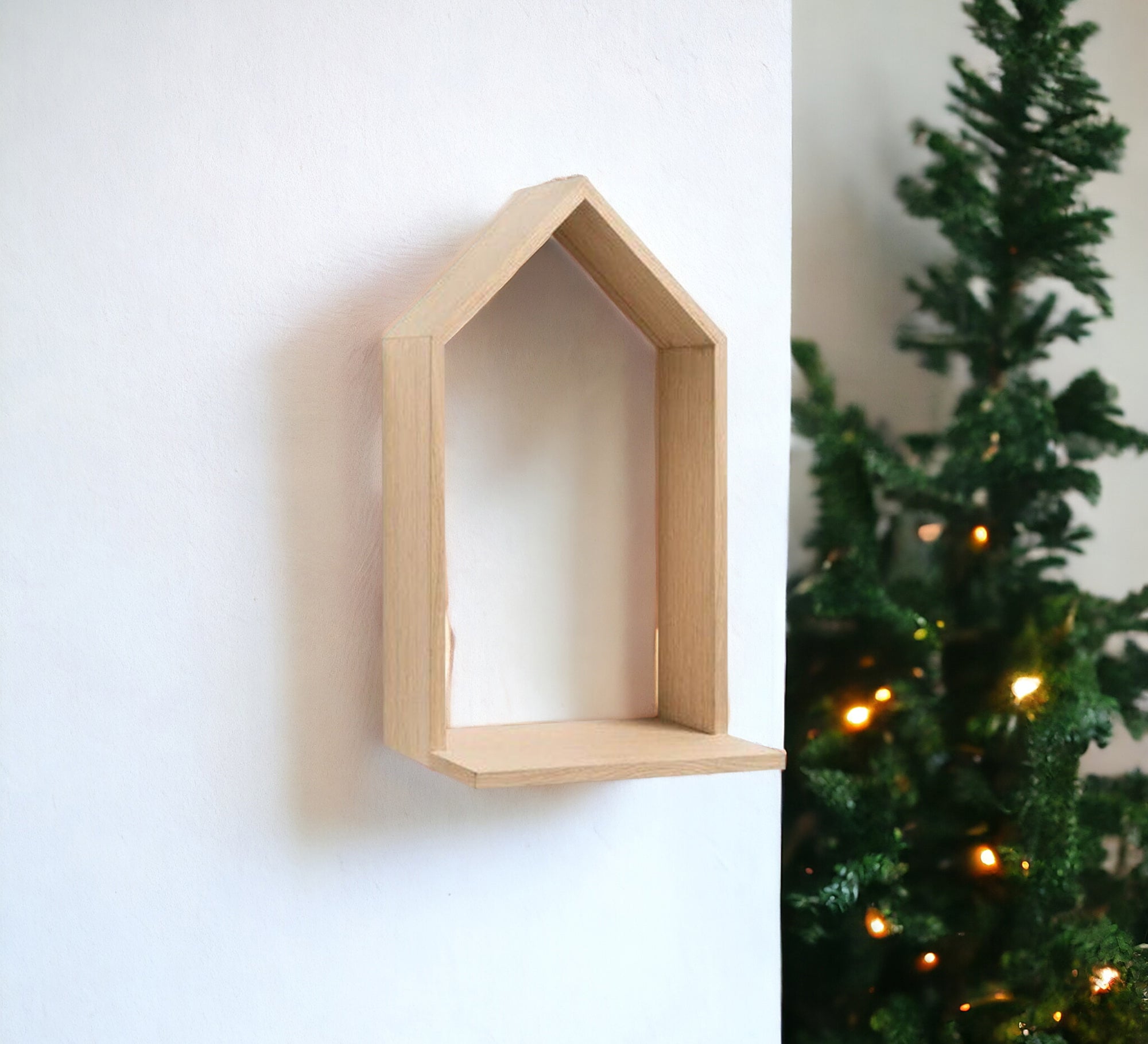 Cottage-shaped wall shelf in beige