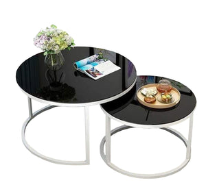 Two circular tables in black and white