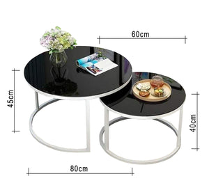 Two circular tables in black and white