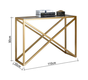 Gold console with an x-shaped structure