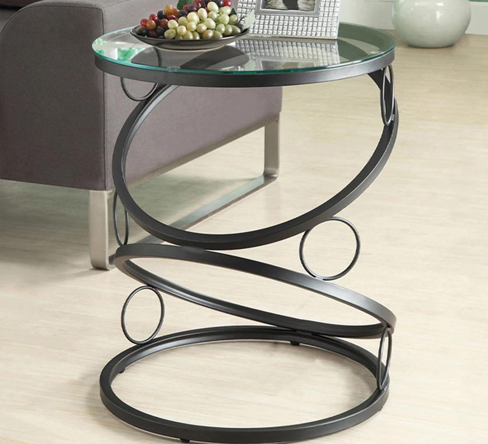 A black circular table with a unique design