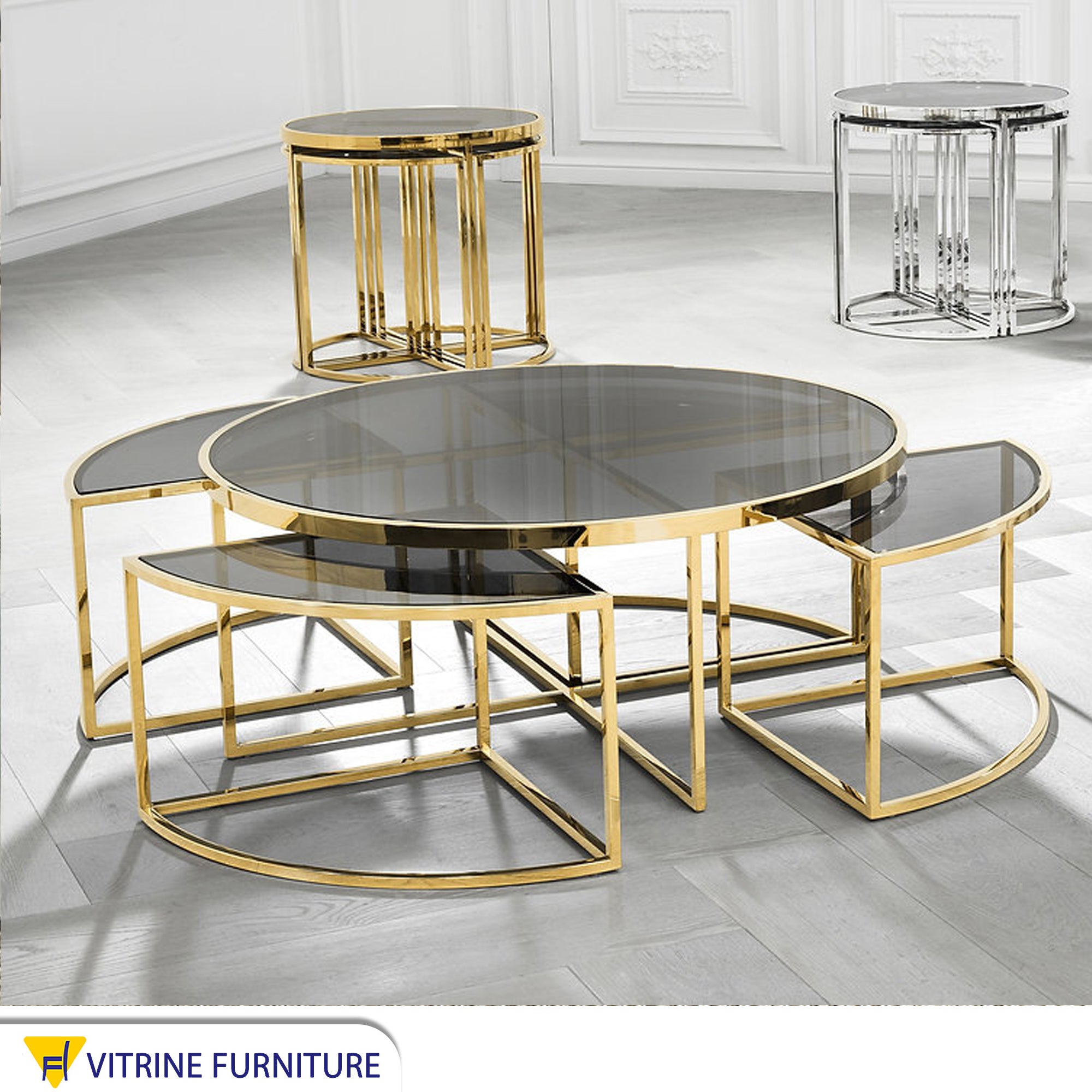 A set of tables with a modern design in golden color