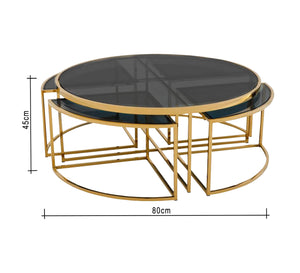 A set of tables with a modern design in golden color