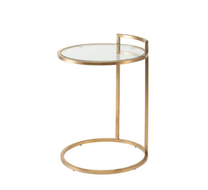 Side table with a circular structure in gold