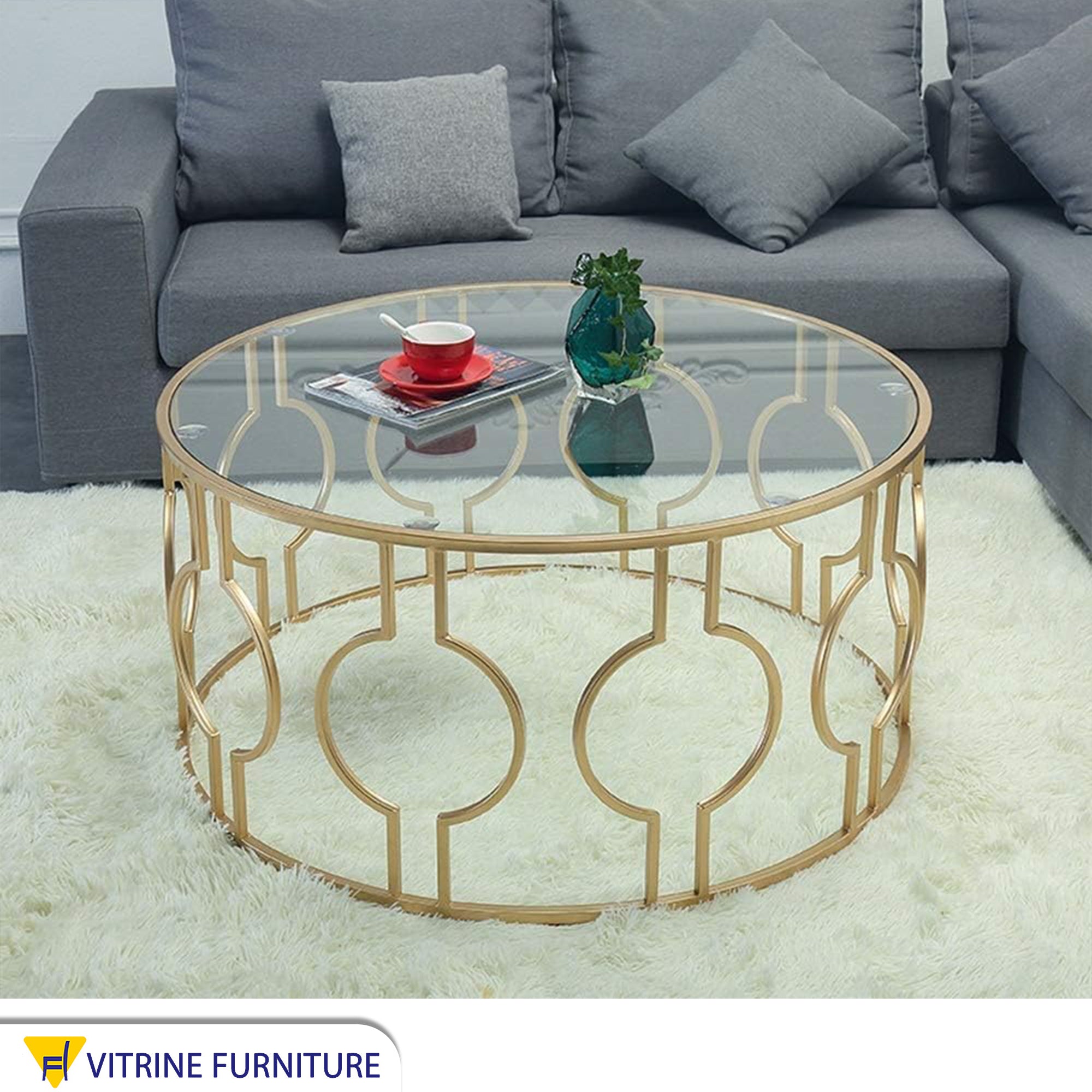 Center table with a decorative metal frame