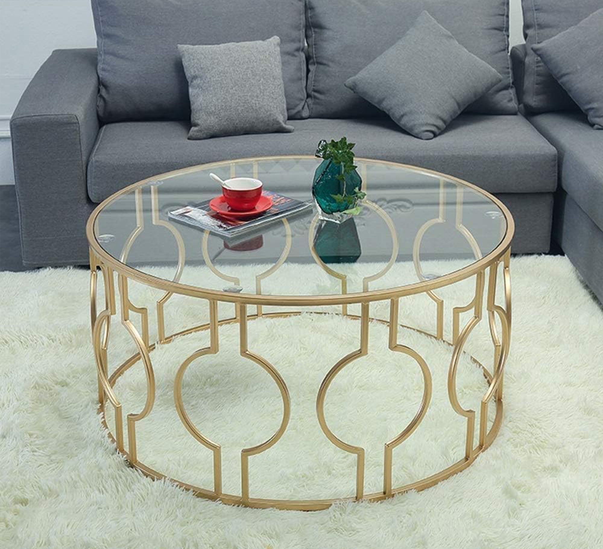 Center table with a decorative metal frame