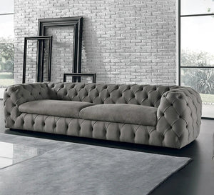 Grey sofa with caputin beads