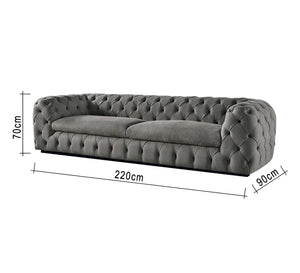 Grey sofa with caputin beads