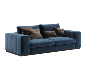 A sofa with recessed lines and armrests