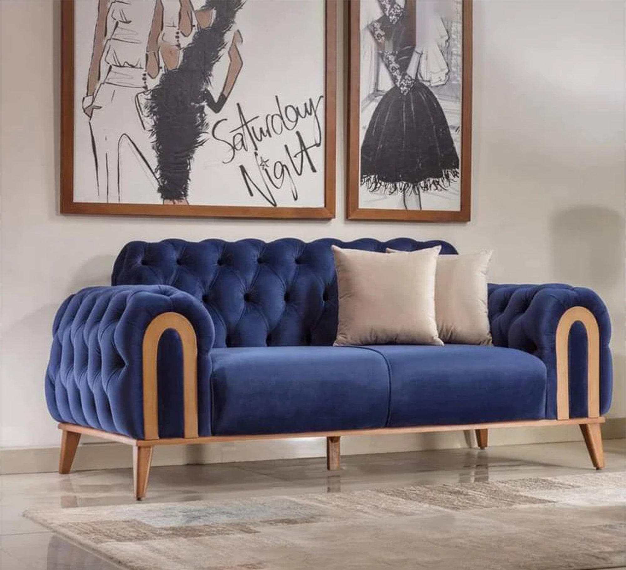 A navy blue sofa with caputin beads