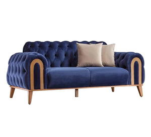 A navy blue sofa with caputin beads