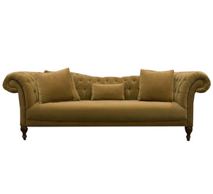 A sofa with twisted cylindrical armrests