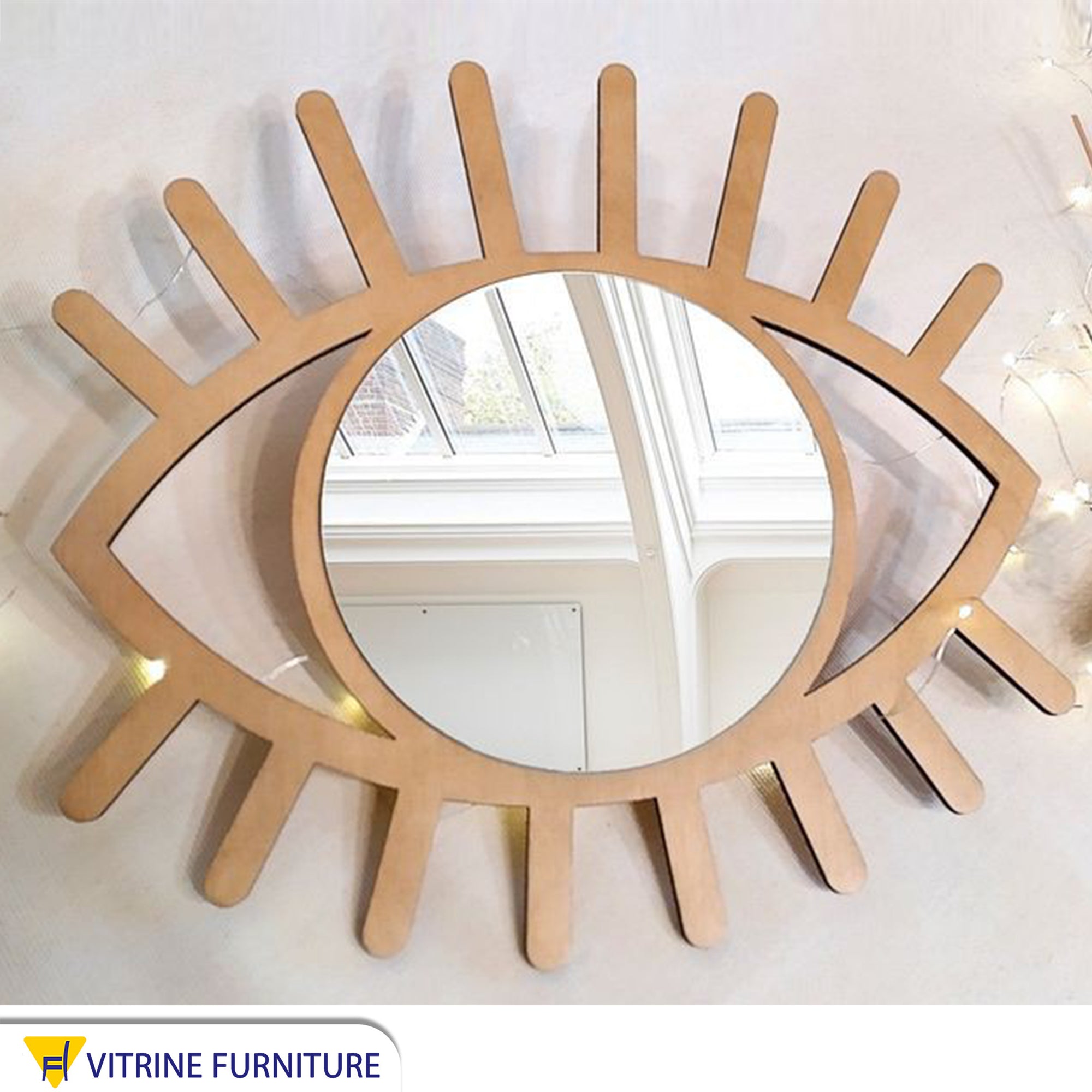 Mirror with a beige eye-shaped frame