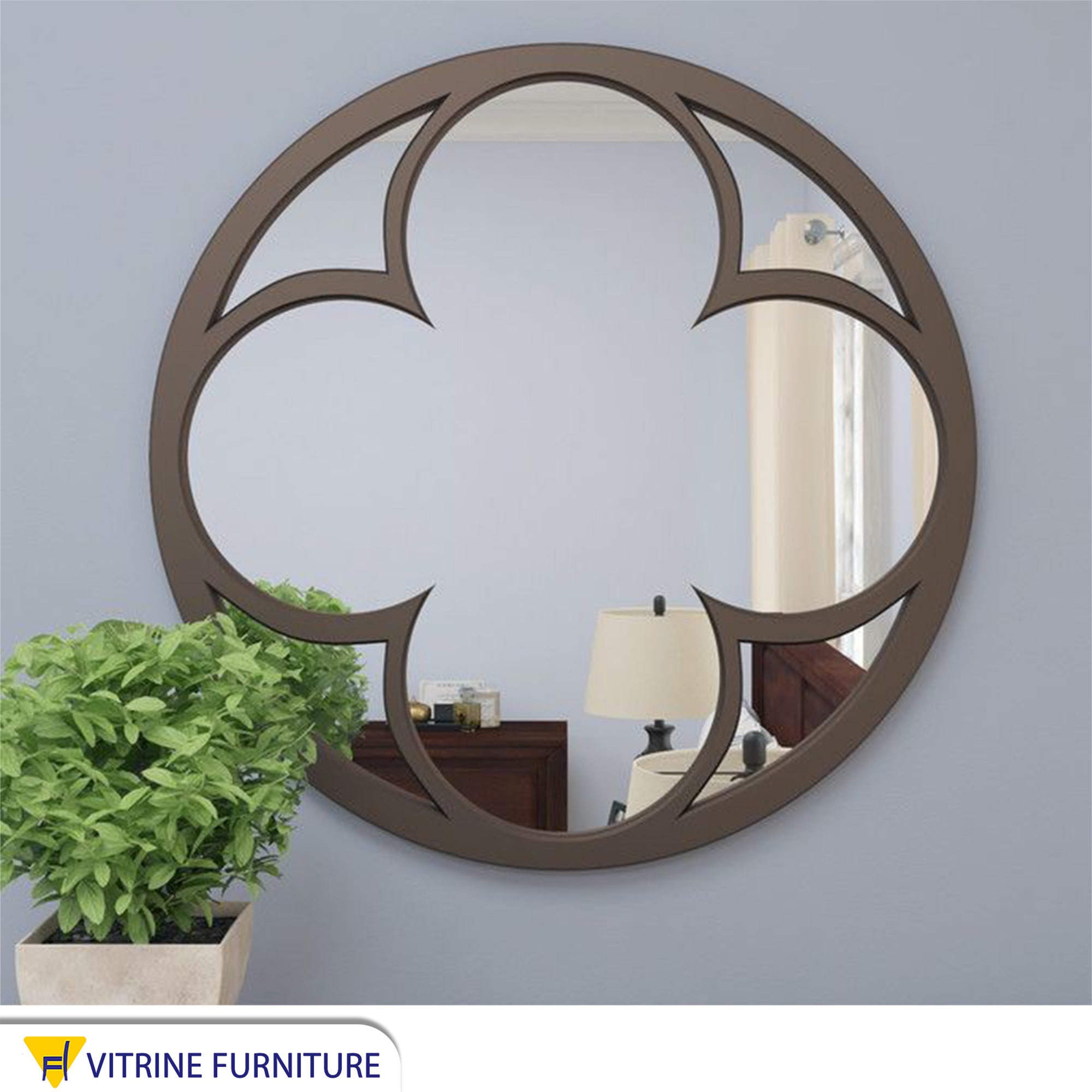 A circular mirror with a rose interior