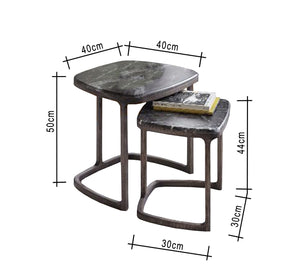 A set of side tables of different dimensions