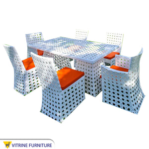 Dining table with glass top and six chairs