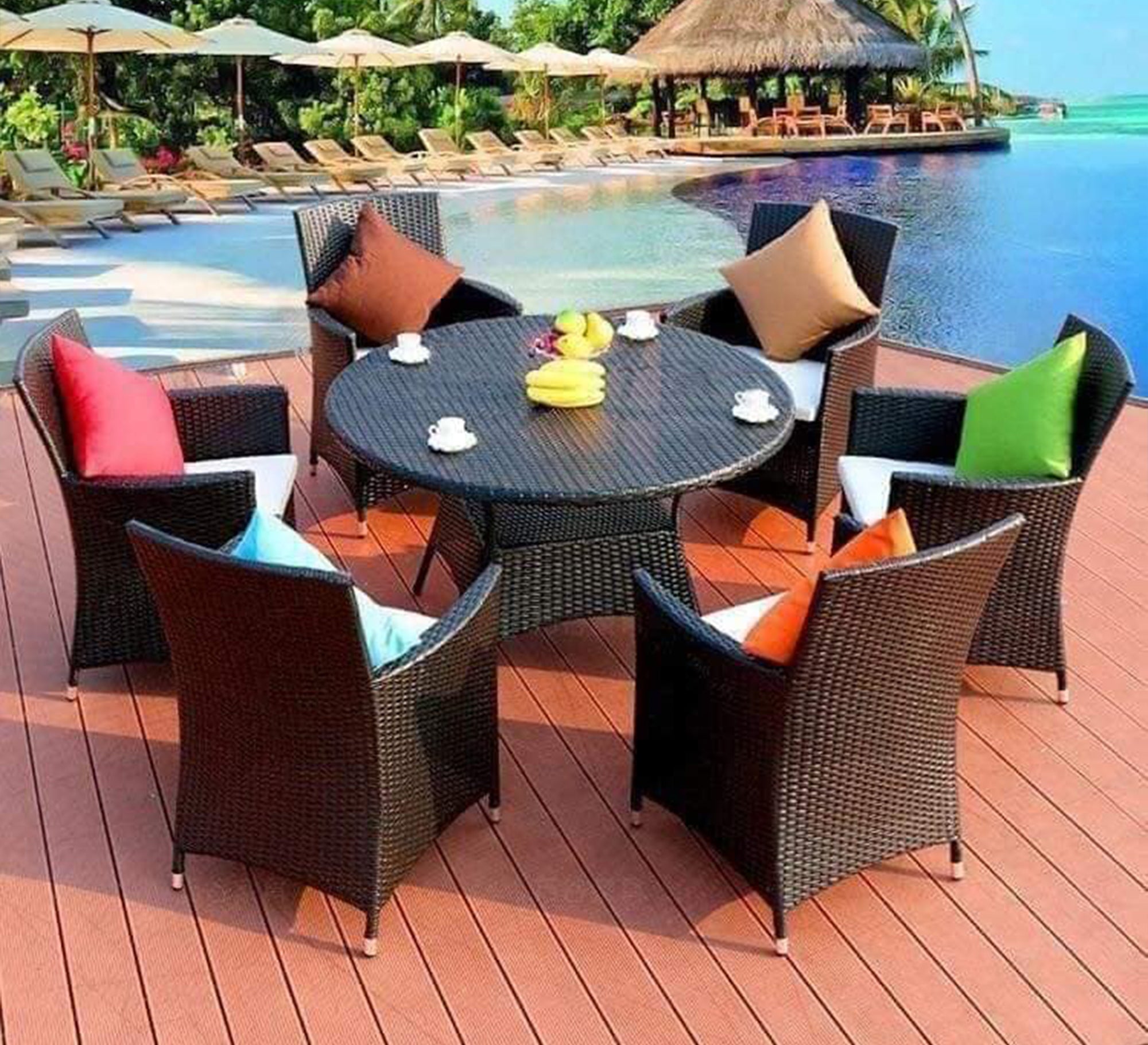 Circular rattan table with eight chairs