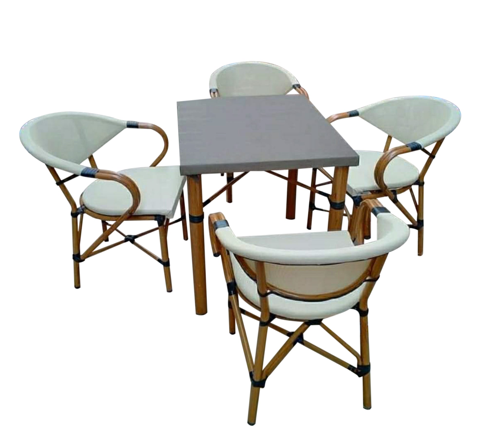 A small dining table with four chairs and a table